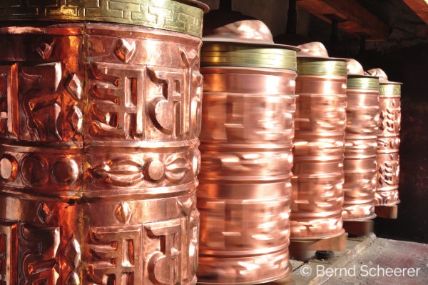 15 reasons to trek in nepal prayer wheels spinning