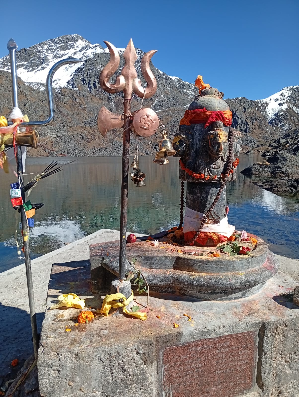 Two of the most sacred symbol of hinduism both represent different facts of lord shiva a Trident